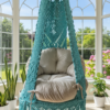 Shop The Top Knott’s premium macrame swing chair, handwoven with cotton rope and paired with a soft cushion. Perfect for living rooms, balconies, or bedrooms – stylish, durable, and comfortable.
