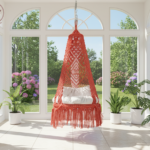 Enhance your home with the Scarlet Rose macramé swing chair. Handcrafted with vibrant scarlet patterns, soft cushions, and bohemian charm — perfect for cozy indoor relaxation.