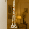 Man Hanging a Handcrafted Macrame Bell