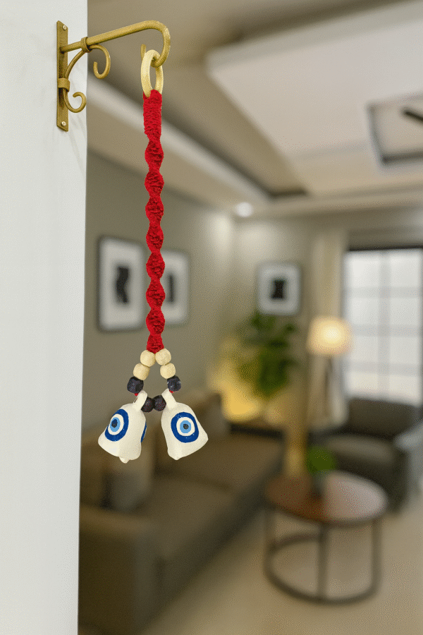 Man Hanging a Handcrafted Macrame Bell