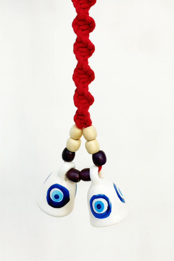 Man Hanging a Handcrafted Macrame Bell